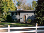 Closeup of house from pasture.