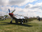 Sweet Revenge is a P-51D.  I've seen this Mustang several times before because it is based in Minnesota.